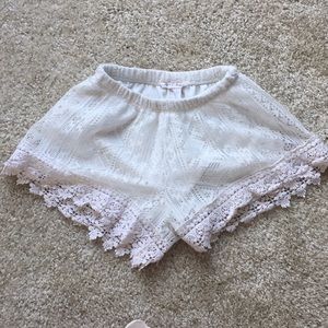 White lace shorts